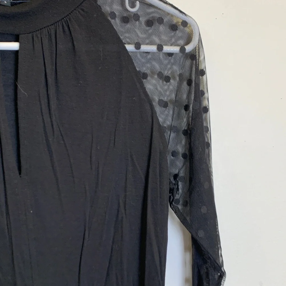 Generation Love Black Top with Sheer Polka Dot Sleeves